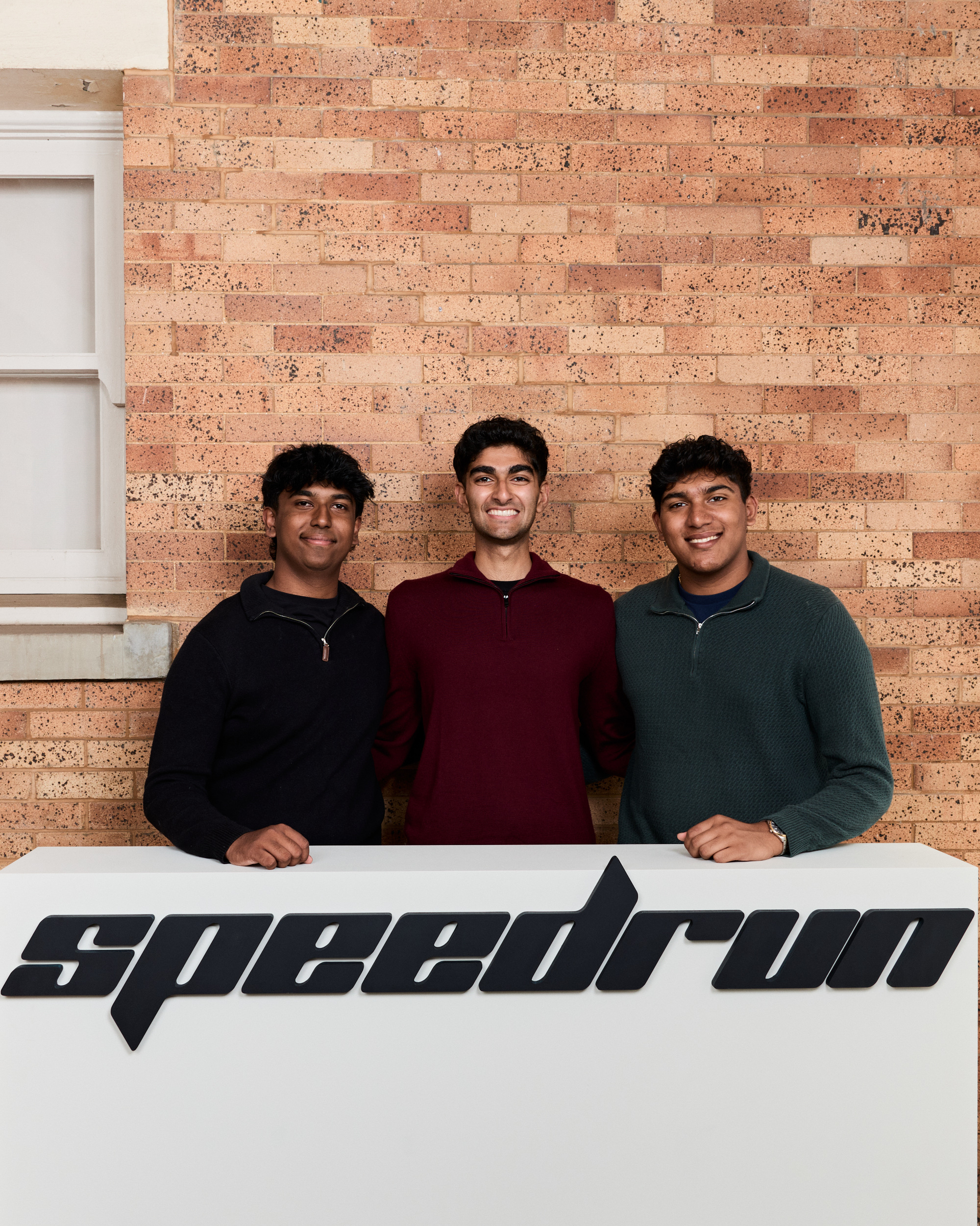 The three Coop co-founders at a16z speedrun.